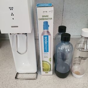 SodaStream soda maker with carbonator refill and bottles